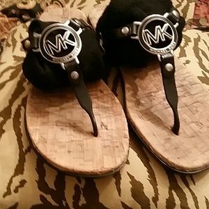 MK sandals size 7, but to small fit more like 6.5